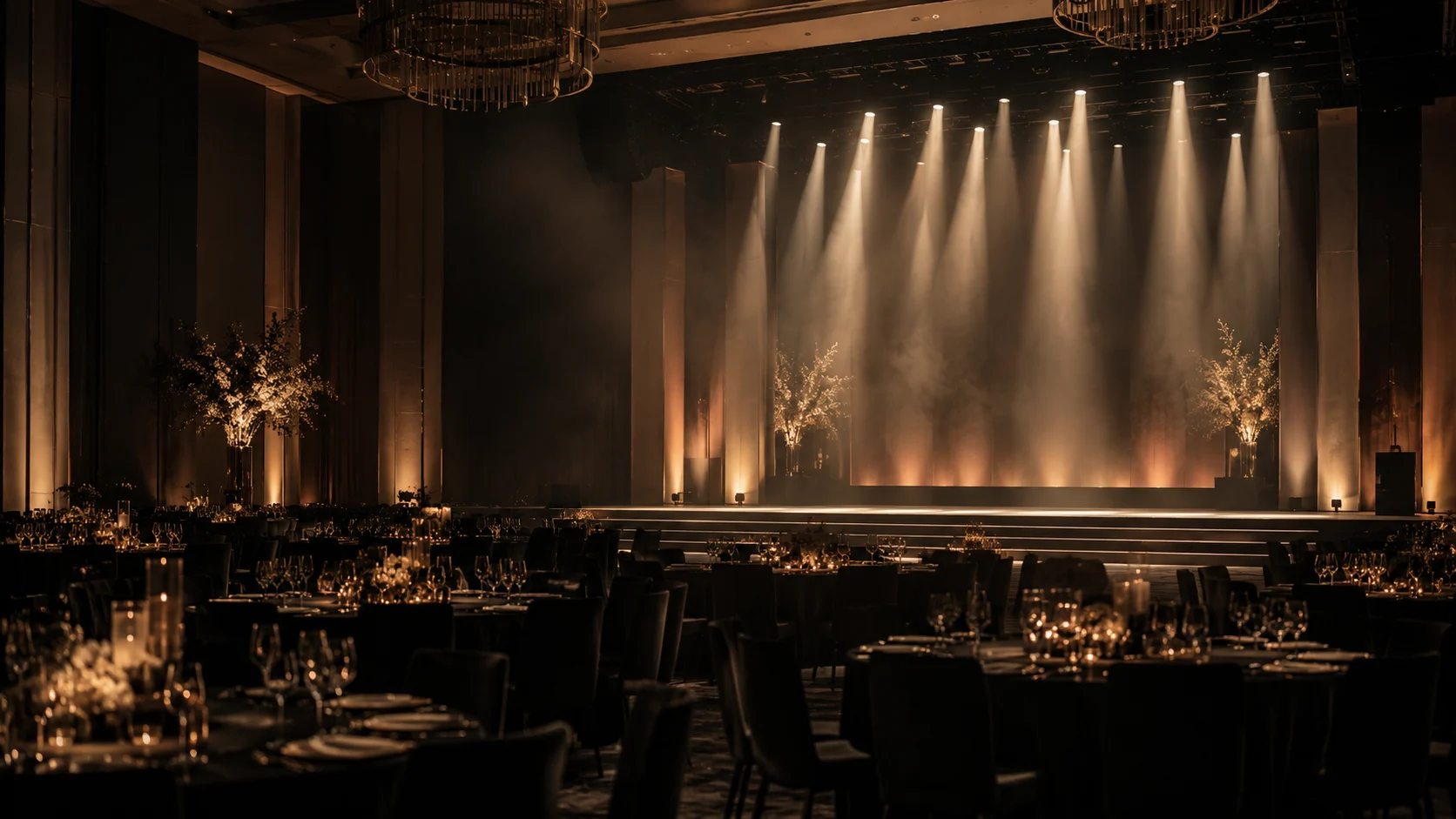 Concept image of an elegant gala stage with warm lighting in a dark ballroom
